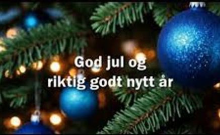 Et blått juletre med lys Et blått juletre med lys